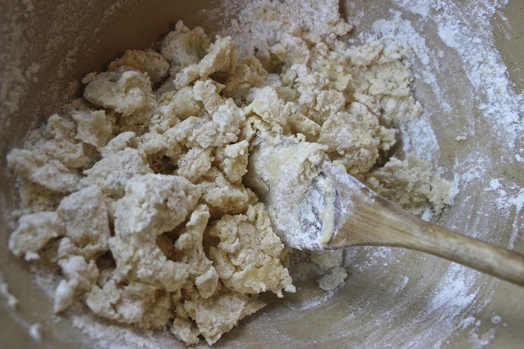 Wilmar blends the flour and powdered sugar before mixing both into the softened butter